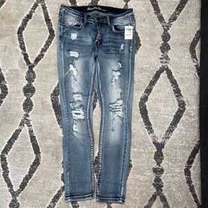 Machine ripped skinny jeans